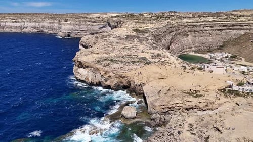 Aerial view of Azure Window remains in Dwerja Bay, Gozo, Malta