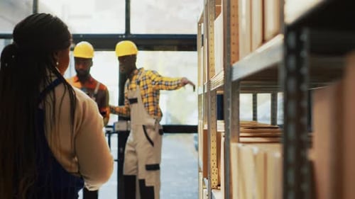 Warehouse Employees Discuss Inventory Control and Distribution