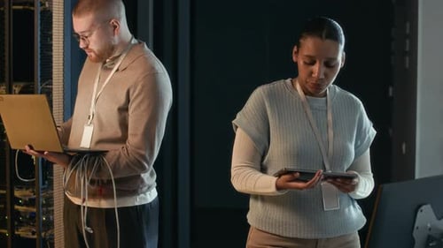 Server Technicians Working in Data Center