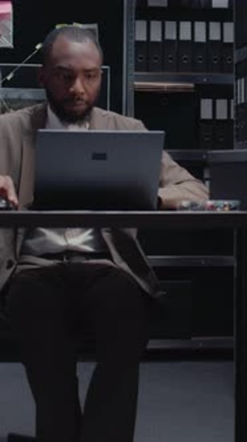 Adult Typing on Laptop then Leans Back