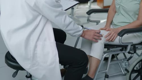 Doctor takes care the patient in hospital nursing home aged care by using health and life insurance