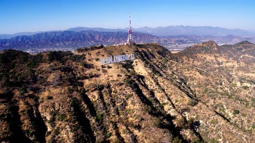 Hollywood sign griffith park observatory and downtown Los Angeles aerial view