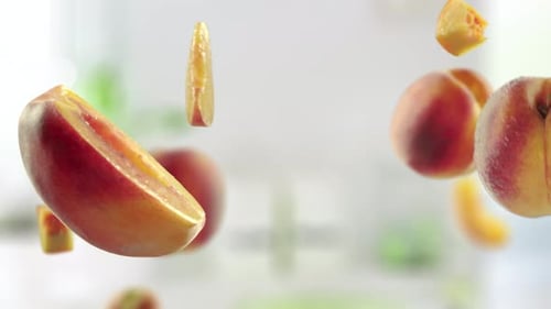 Peaches and Sliced Peaches Rotating and Floating