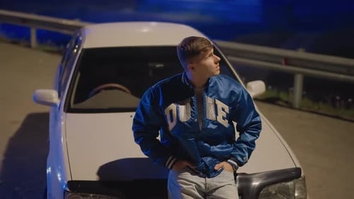Quiet Night Reflection Silent Highway Scene with Thoughtful Driver and Blue Tint Pensive Individual