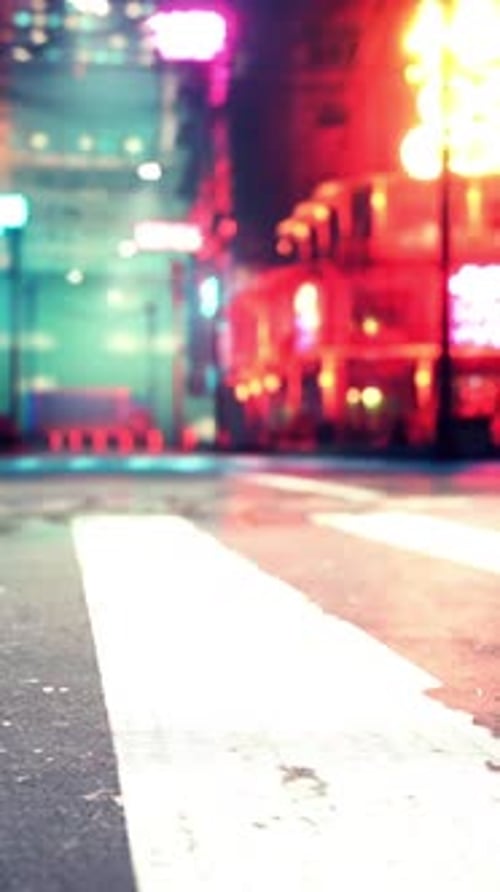 A City Street with a Crosswalk at Night