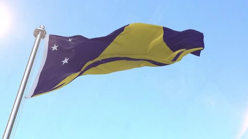 Bandera de Tokelau ondeando en el cielo