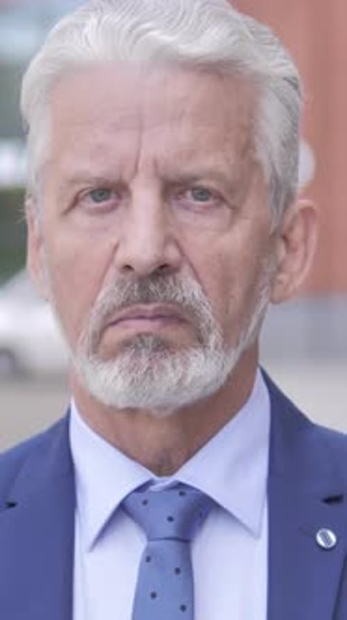 Close Up Portrait of a Mature Man in Suit