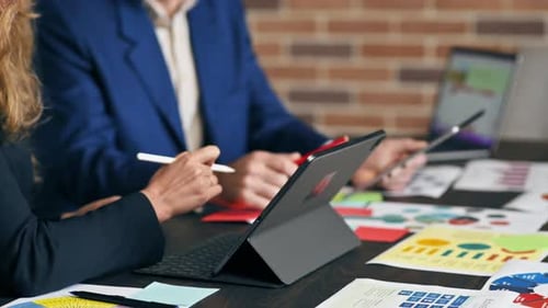 Business session in an office. Woman and a man gesticulating
