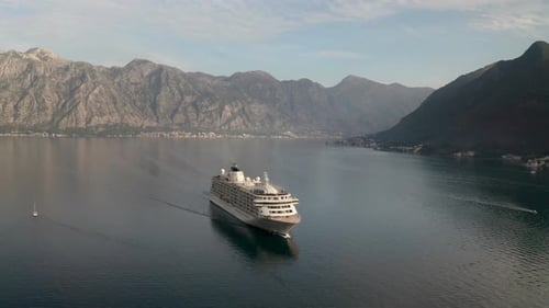Large cruise ship passing through the picturesque bay of Kotor in Montenegro