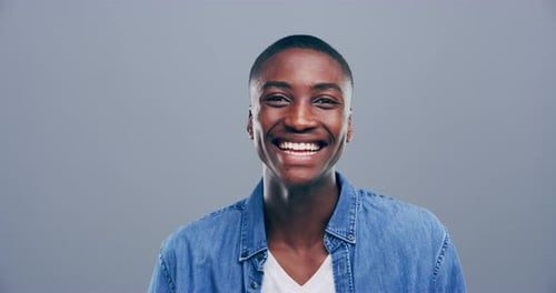 Enthusiastic Man Smiling and Giving Thumbs Up