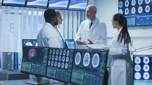 Medical Professionals Reviewing Brain Scans in Modern Office
