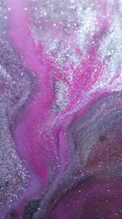 Pink, Purple, and Silver Liquid Glittering Abstract Background