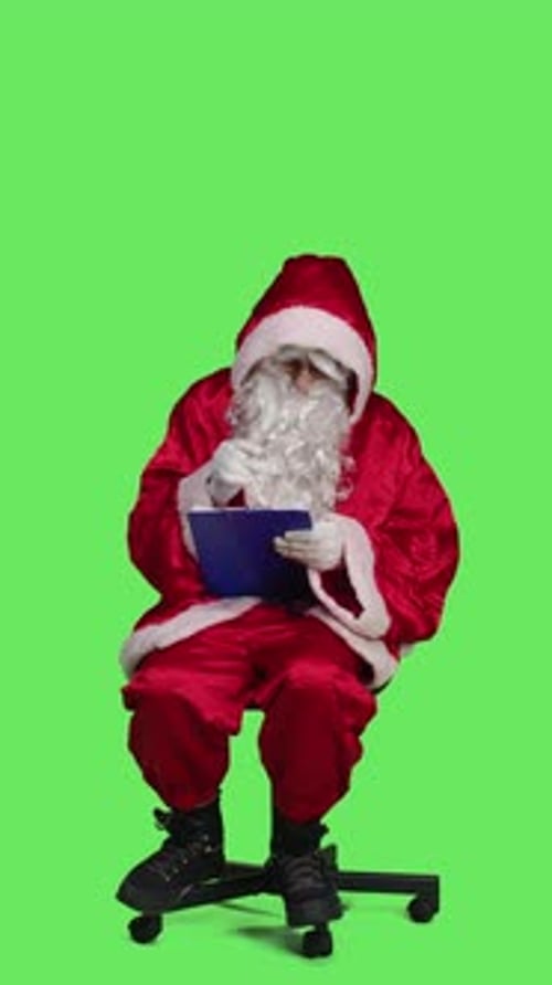 Vertical Video Front View of Winter Character Taking Notes on Papers