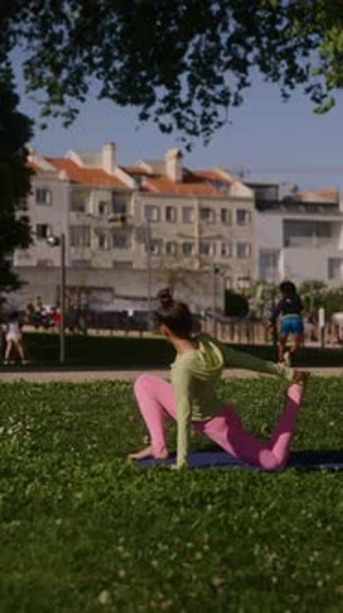 Engaging in a Yoga Practice in a Park Cultivating Flexibility and Mindfulness Amidst Nature