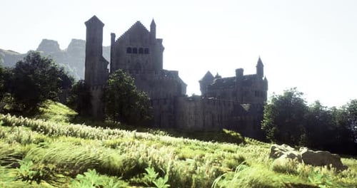 Majestic Medieval Castle Surrounded By Lush Greenery and Mountains at Dawn