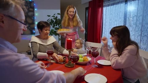 Family Gathered for Celebratory Dinner at Home