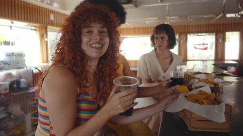 Group of friends eating in a diner restaurant