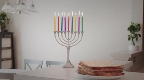 Hanukkah Menorah and Matzah on Table Indoors