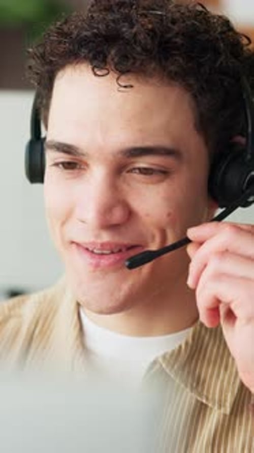 Call center consultant, contact us and man speaking for trip reservation, booking holiday and smile