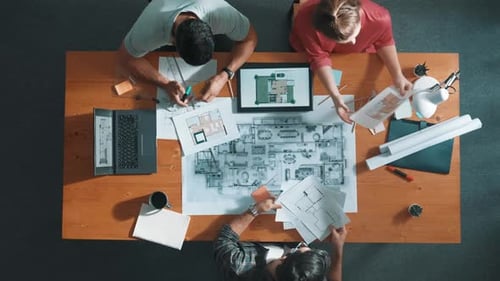 Time lapse of engineer working together while hand out document. Symposium.