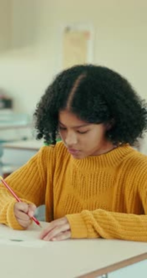 Learning, writing and exam with girl in classroom for education, knowledge and growth