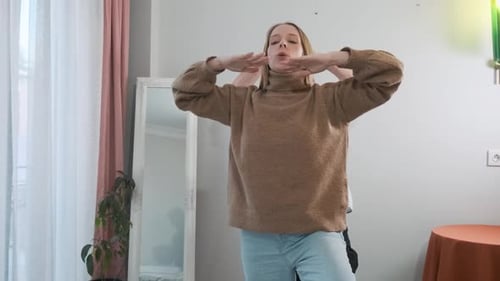 Woman Practicing Yoga Pose with Senior Man