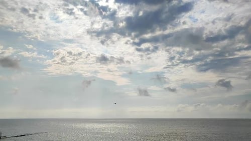 Fast Moving Rain and Cumulus Clouds Sky Over Sea Sunny Day Season Rainy Cloudy