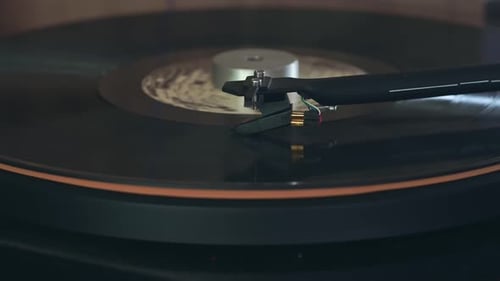 Vinyl Record Spinning on a Turntable Close Up