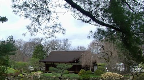 Japanese Garden With Tranquil Building and Water Feature