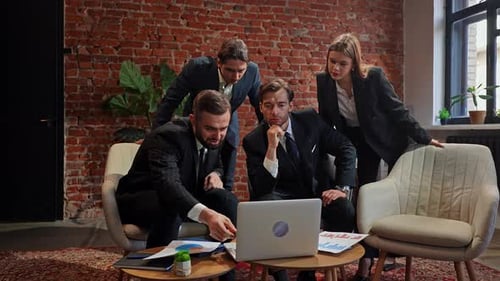 Collaborative Business Team Meeting in Modern Office Setting