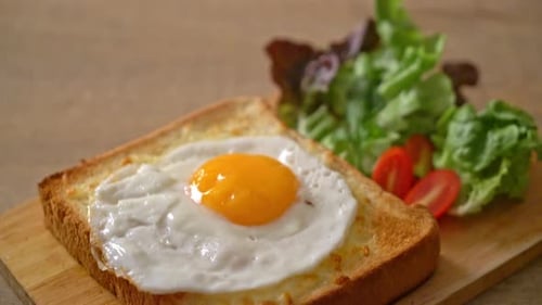 Sunny-Side-Up Egg on Toast with Fresh Salad
