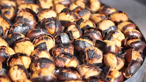 Roasted Chestnuts Being Prepared at Street Market