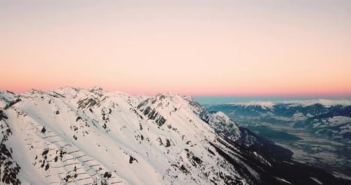 Epic Aerial Flight towards Mountain sunset evening Peaks Inspirational Motivational Nature Backgrou