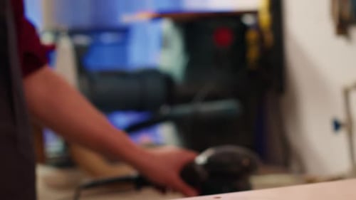 Changing Sandpaper on an Orbital Sander Close Up