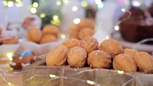 Close Up of Holiday Baked Goods with Powdered Sugar
