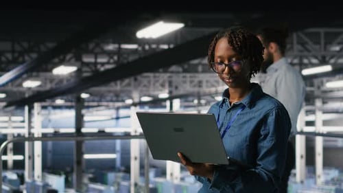 Data Center Software Developers Using Devices to Review AI LLM Visualizations