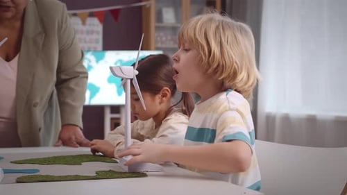 Elementary School Kids Studying Alternative Energy in Class