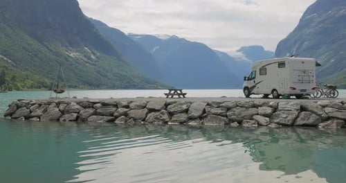 Family vacation travel RV, holiday trip in motorhome. Beautiful Nature Norway natural landscape.