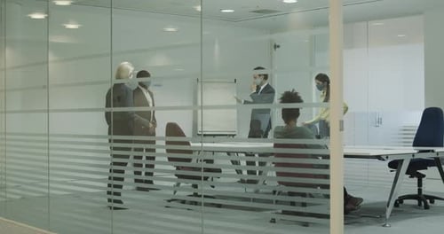 Business Colleagues Meeting in Modern Office Conference Room