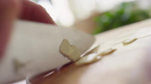 Cutting garlic onion vegetables on plate