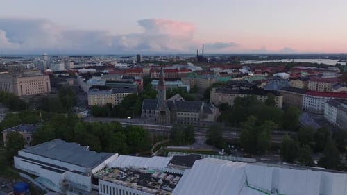 Aerial Panoramic View of City at Twilight Historic Building of Finnish National Museum Helsinki