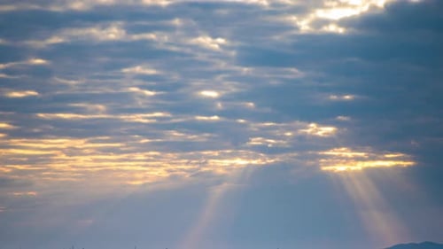 Rays of the Sun Shine Through Clouds Over Black Sea