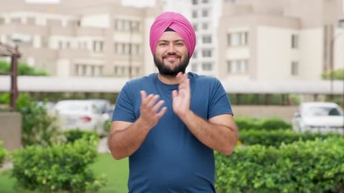 Sikh Indian Man Clapping