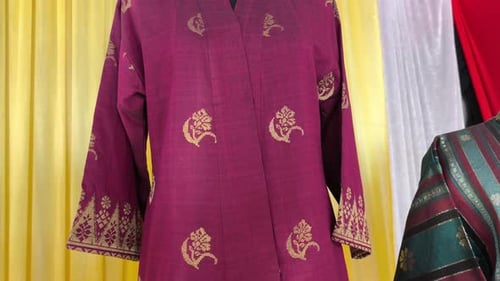 Traditional Outfit Displayed on Mannequin in Fashion Setting