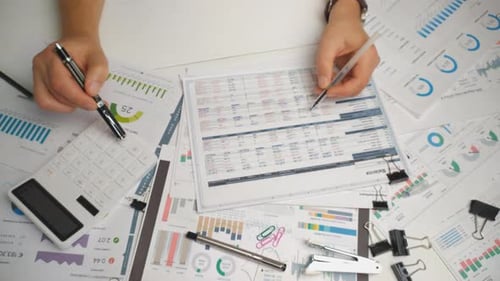 Office Work: Calculating Finances at the Desk