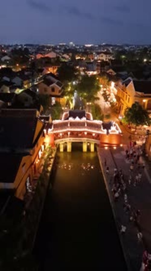 Aerial view of Chua Cau or Japanese Covered ancient Bridge in night