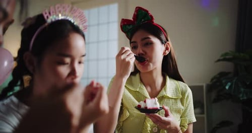 Friends Celebrate Birthday with Cake and Conversation