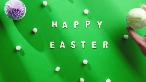 Festive Easter Decoration with Paper Eggs on Green