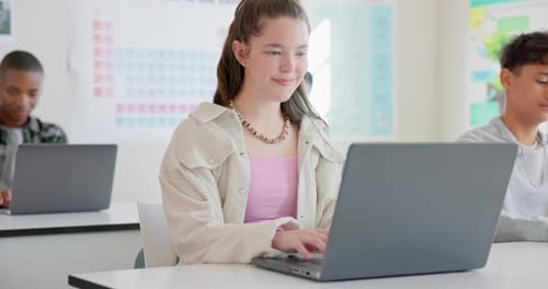 Girl, students and laptop in a classroom, education and knowledge with connection