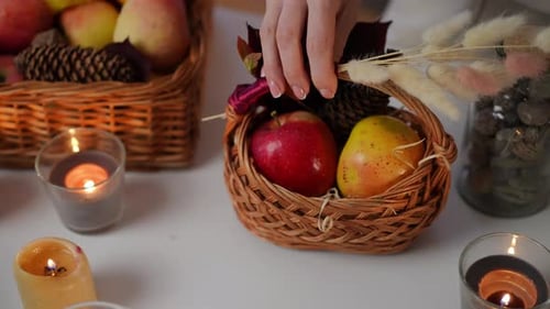 Apples and Candles Decorating a Fall Table
